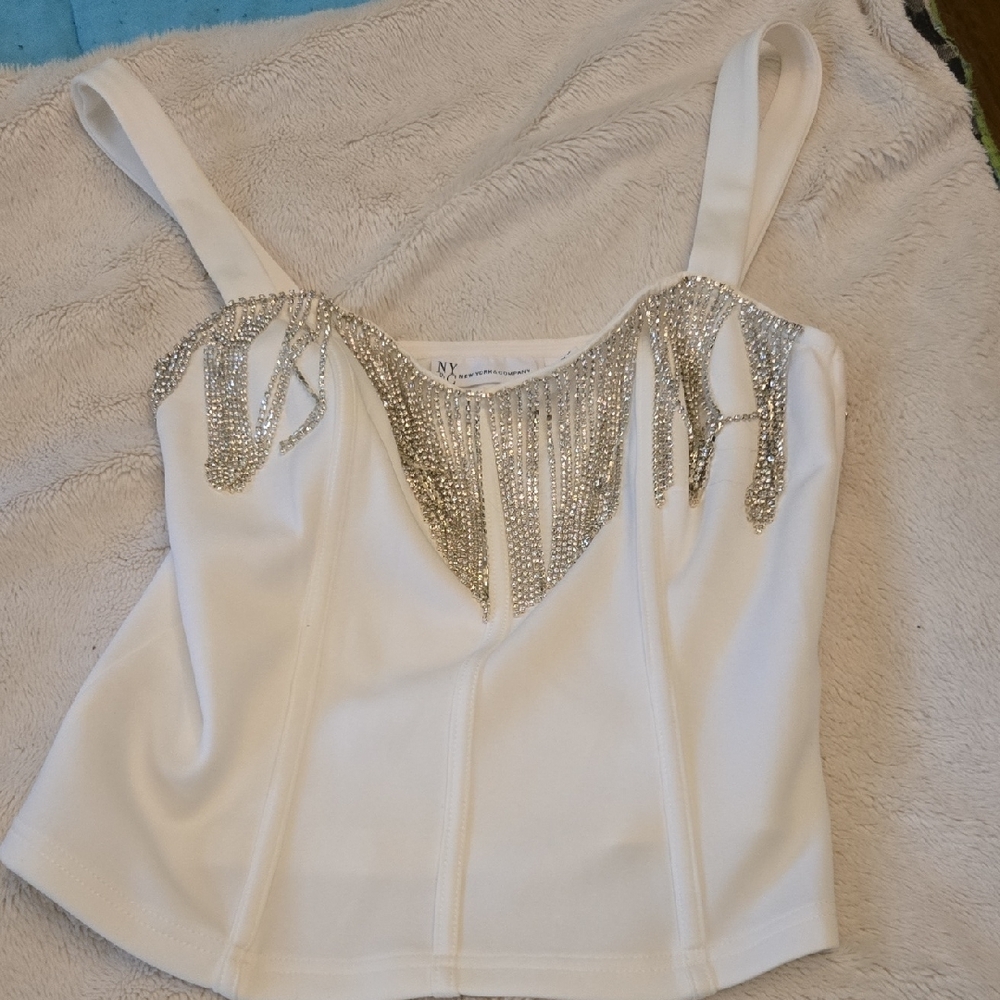 Elegant White Top with Silver Accents
